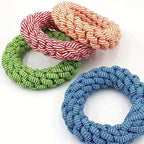 Three colorful rope bracelets on a white background