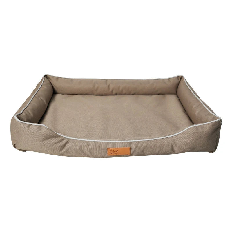 Brown pet bed with a visible brand logo on a white background