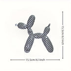 Black and white checkered dog toy shaped like a balloon with dimensions on a white background