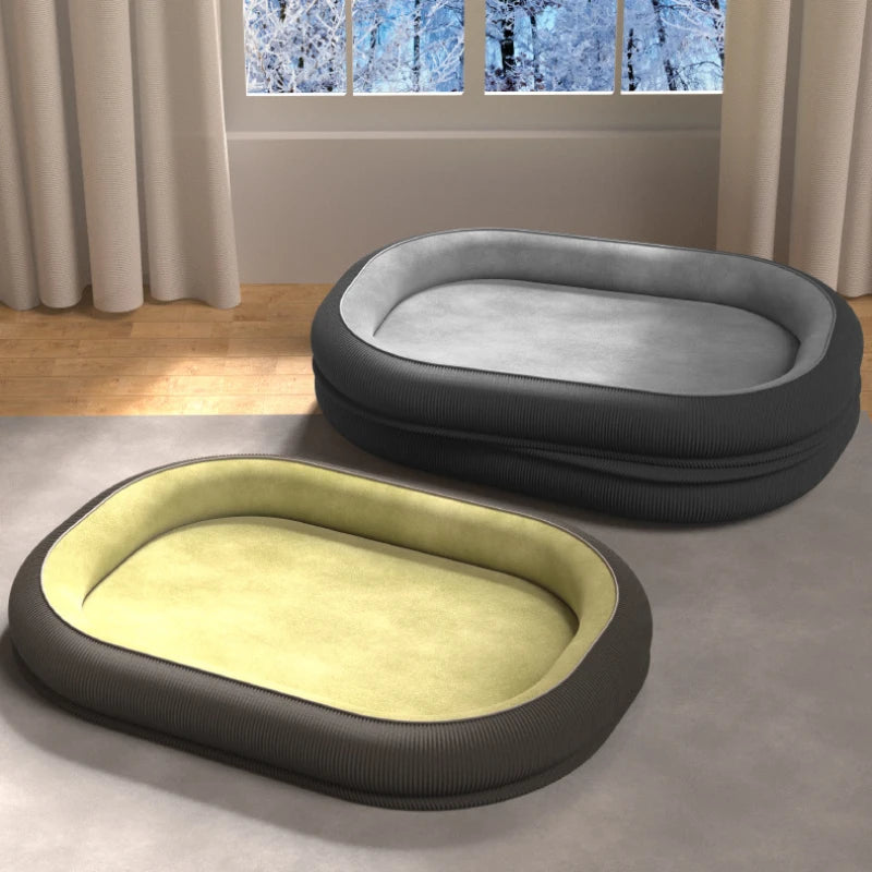 group of dog beds on a concrete floor with a window in the background.