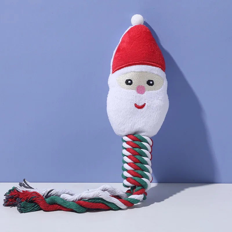 Santa Claus dog toy with a rope on a light blue background